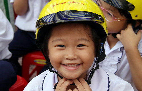 Little Girl wearing J&J supported helmet (photo)