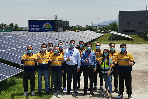 The Xi’an site team after completing the second phase of photovoltaic (PV) panel installation. (photo)