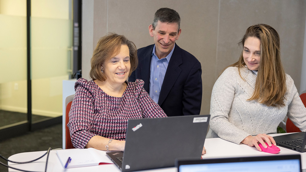 J&J colleagues working together at the office (photo)